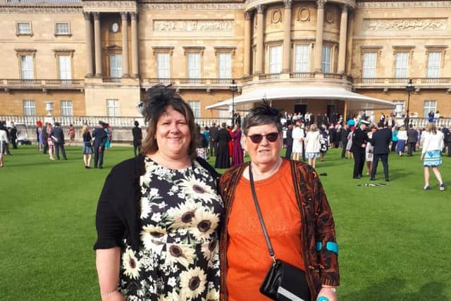 Volunteers Sharron Reynolds and Margaret Nuttall at Buckingham Palace.