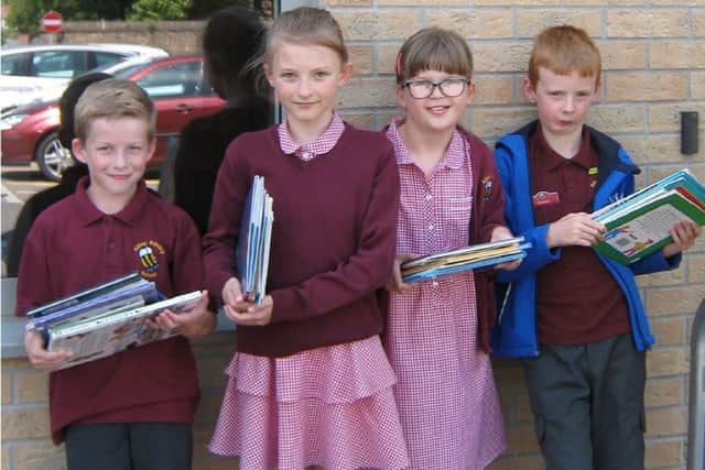 Pupils from Abbey Primary School donated library books to the British Heart Foundation