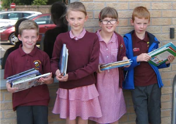 Pupils from Abbey Primary School donated library books to the British Heart Foundation