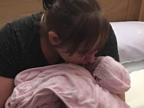 Becky with her daughter Freya in the hospital.