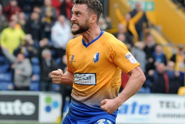 Miller celebrates scoring for Mansfield Town against Crewe in April