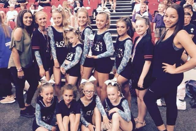 Members of the successful All Saints Allstarz cheerleading team.