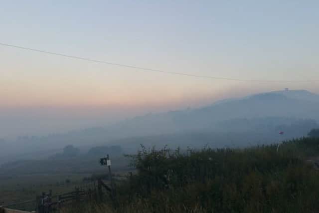Firefighters from Mansfield have been called in to help battle a huge blaze at Winter Hill near Bolton.