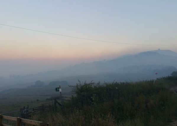 Firefighters from Mansfield have been called in to help battle a huge blaze at Winter Hill near Bolton.