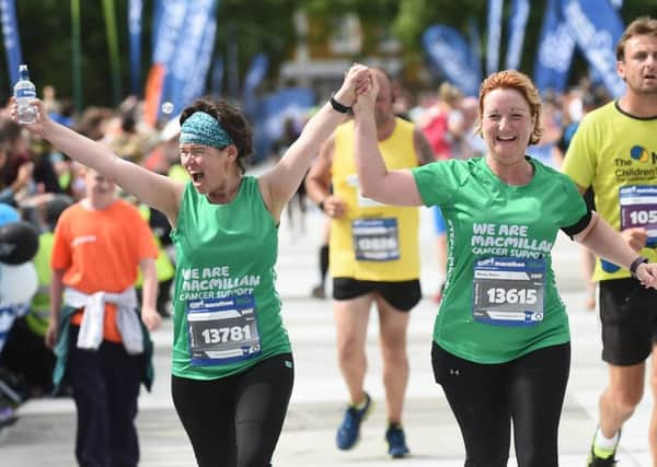 Raising money at events like the Robin Hood Marathon will help keep services like Macmillan's helpline running