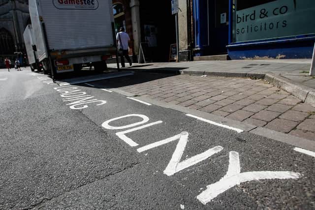The misspelled road marking.