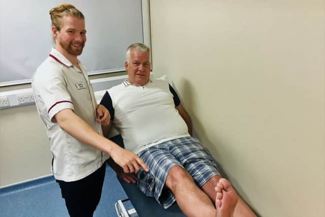 Grandad Edwin Wallace with physio Sam Smart after his operation.
