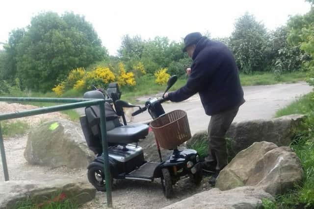 Mr Pilling struggles to access the trails on his mobility scooter