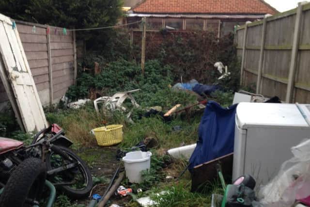 A Kirkby man has been fined for having a messy garden