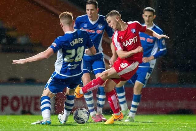 Rochdale vs Chesterfield - Jake Orrel has a shot blocked - Pic By James Williamson