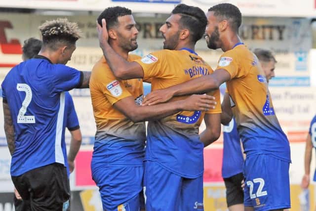 Mansfield Town v Sheffield Wednesday.Mal Benning celebrates his first half goal with Jacob Mellis and CJ Hamilton.