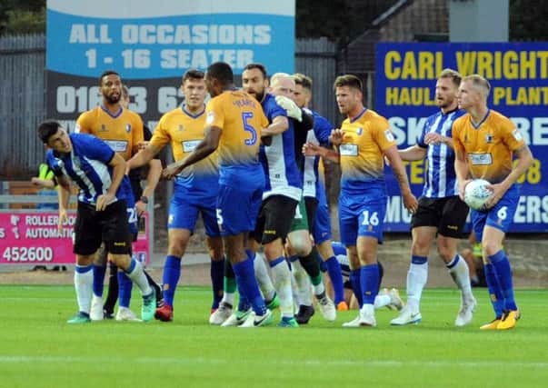 Mansfield Town v Sheffield Wednesday.
Flash point at the end of play between Forestieri and Krystian Pearce.