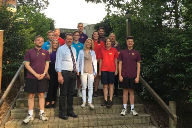 Secretary of State, Esther McVey, with employees at Center Parcs