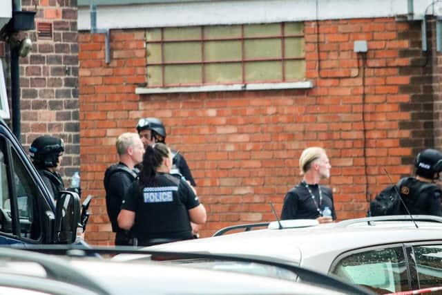 Police at the scene in Huthwaite yesterday.