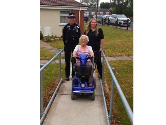 Pictured from left are PCSO Kerry Darrington, Norma King on her new scooter and Park Mobility's Beth Holland who delivered it.