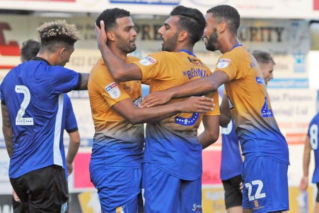 Mansfield Town v Sheffield Wednesday.Mal Benning celebrates his first half goal with Jacob Mellis and CJ Hamilton.