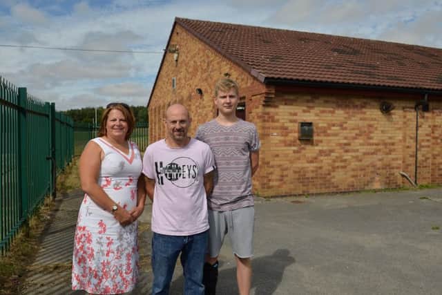 A new committee have taken over the running of Meden Vale Village Hall, pictured from left are councillor Sharron Adey, Kenjiro Evans and Danny Gammond