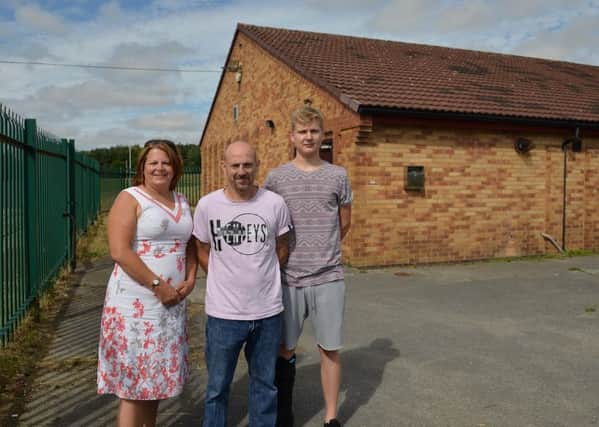 A new committee have taken over the running of Meden Vale Village Hall, pictured from left are councillor Sharron Adey, Kenjiro Evans and Danny Gammond