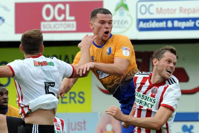 Mansfield Town v Sheffield United.Matt Preston makes his presence known in the second half.