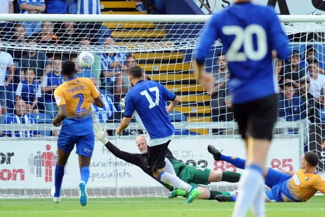 Mansfield Town v Sheffield Wednesday.
Conrad Logan keeps Wednesday out at the start of the second half.