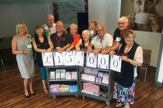 Kings Mill Hospital volunteers donate Â£15,000 to gamma scanner appeal, helping reach a total of more than Â£115,000 in the first four months.