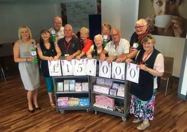 Kings Mill Hospital volunteers donate Â£15,000 to gamma scanner appeal, helping reach a total of more than Â£115,000 in the first four months.
