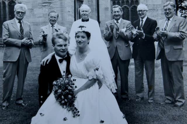 Joanâ¬"s daughter who died from leukemia 25 years ago pictured on her wedding day with members of the Rotary Club