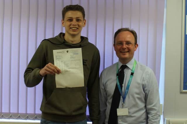 Daniel Freeman with head teacher Carl Atkin.