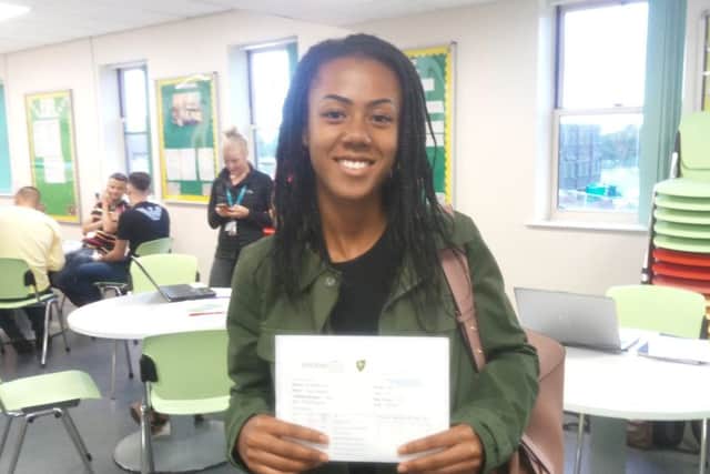 Olivia Bramble celebrating her A level results at Brunts Academy.