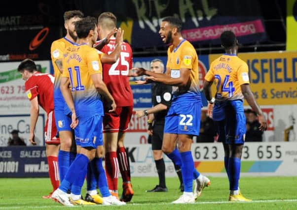 Mansfield Town v Accrington Stanley. 
CJ Hamilton is all smiles after getting on the score sheet.
