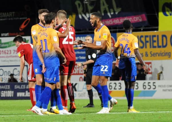 Mansfield Town v Accrington Stanley. 
CJ Hamilton is all smiles after getting on the score sheet.