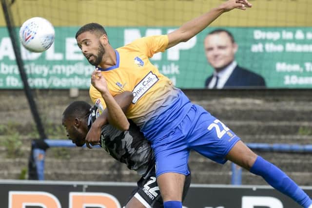 Mansfield Town v Colchester
Skybet League 2
CJ Hamilton beats Kane Vincent-Young in the air