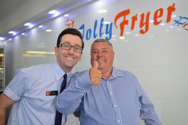 The Jolly Fryer, Kirkby-In-Ashfield are celebrating 10th year in business, owner Theo Tsiolas is pictured with customer Warren Nuttall