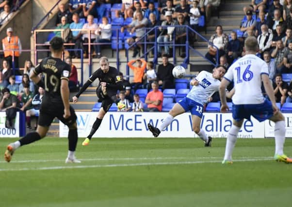 Mansfield Town's Neal Bishop shoots at the Rovers goal: Picture by Steve Flynn/AHPIX.com, Football: Sky Bet League Two match Tranmere Rovers -V- Mansfield Town at Prenton Park, Birkenhead, Merseyside, England copyright picture Howard Roe 07973 739229