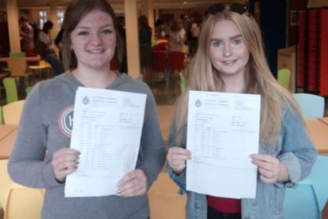 All Saints students Shannon Cunningham and Mary Kate Walker celebrate their GCSE results.