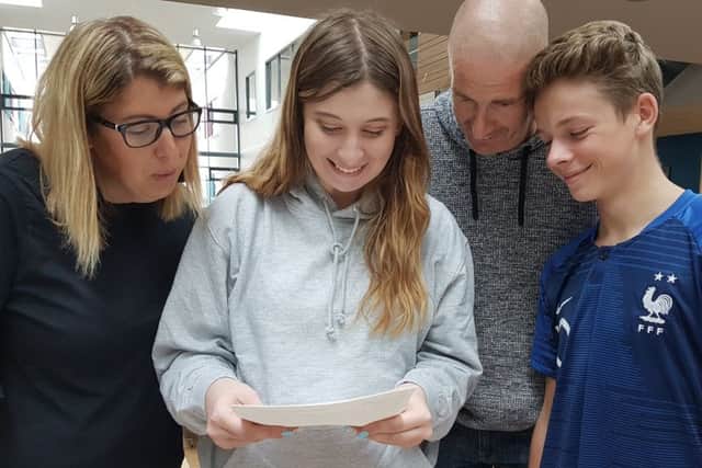 Isla Howe (second left) with mum Elise, dad Adam and brother Jacob.