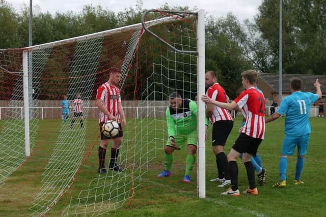 The ball lands in the net for the first goal of Julian Toplisss hat-trick. (PHOTO BY: Mark Asher)