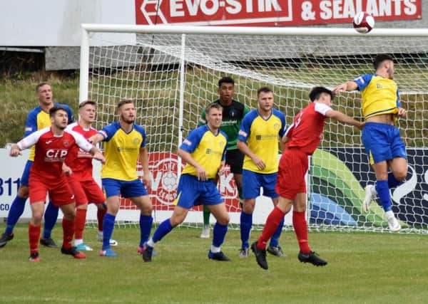 Goalmouth action from AFC Mansfields 2-1 defeat at Stocksbridge Park Steels. (PHOTO BY: Peter Craggs)