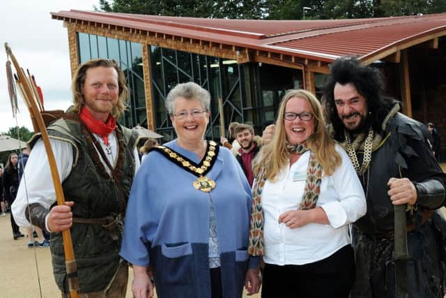 Robin Hood and the Sheriff of Nottingham accompany, Nottingham County Council chairman, Coun. Sue Saddington and the regional director of the RSPB, Emma Marsh, to the opening ceremony of the Robin Hood Festival 2018.