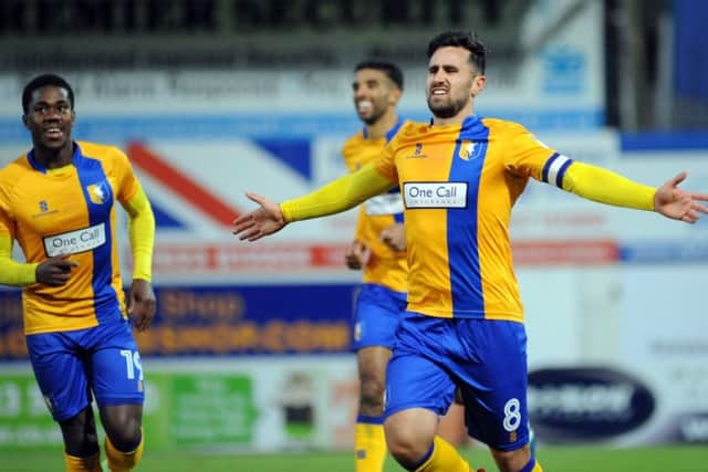 Chris Clements celebrates a goal during his spell at Mansfield Town.