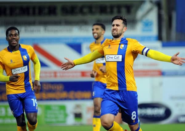 Chris Clements celebrates a goal during his spell at Mansfield Town.