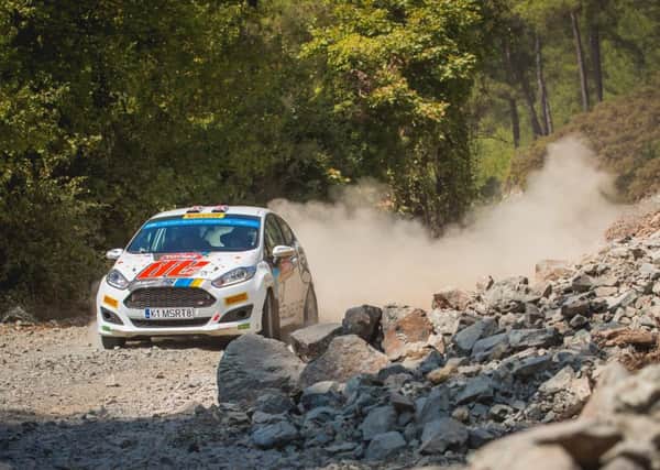 Phil Hall guiding Tom Williams on the tough roads of Turkey. (PHOTO BY: M-Sport/JWRC).