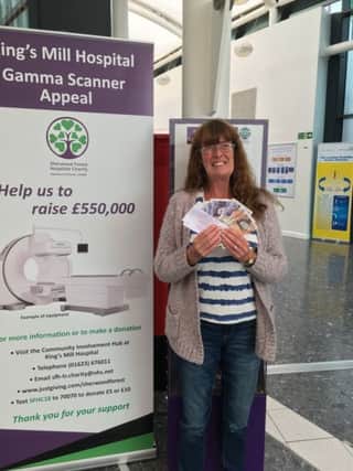 Resident Diane Bradbury celebrates winning Â£100 at the Gammer Scanner Appeal raffle.