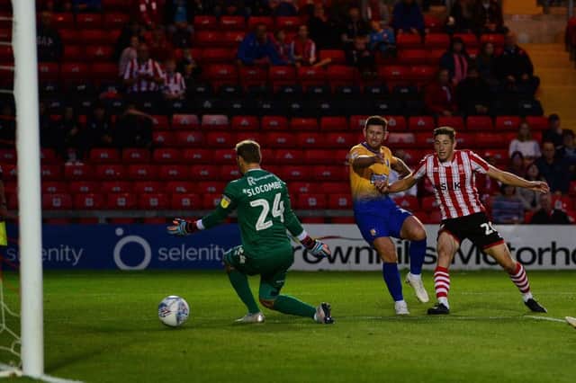 Picture by Howard Roe/AHPIX.com;Football;Skybet; EFL Trophy
Lincoln City v Mansfield Town
4/9/2018  KO 7.45 pm; Sincil Bank;
copyright picture;Howard Roe;07973 739229

Stag's Callum Butcher  levels the score against the Imps