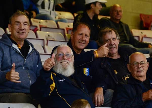 Stags fans enjoy their night at Sincil Bank.
