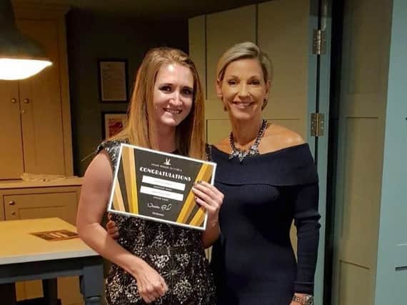 Ann Summers Mansfield store manager, Jade Donovan poses with Ann Summers Managing Director, Vanessa Gold after receiving the award for Second-best Performing UK Store 2018