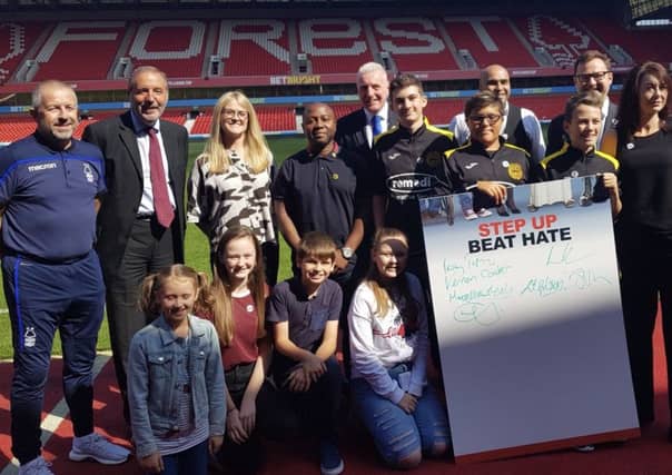 Suppoters of the Beat Hate campaign at the summit at Nottingham Forest FC