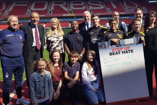 Suppoters of the Beat Hate campaign at the summit at Nottingham Forest FC