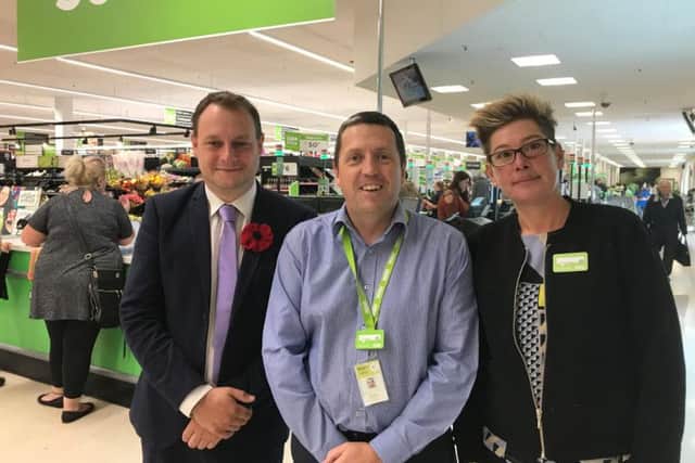 Councillor Jason Zadrozny, Richard Jackson, Manager of ASDA and Julie Sisson, Assistant Manager.