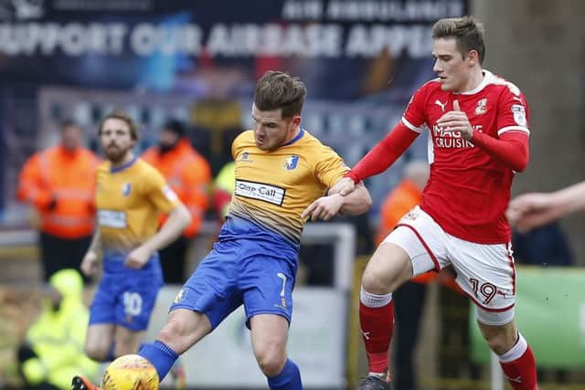 Timi Elsnik, pictured playing for Swindon last season against Mansfield, is already having an impact with Stags following his loan move from Derby County, says David Flitcroft